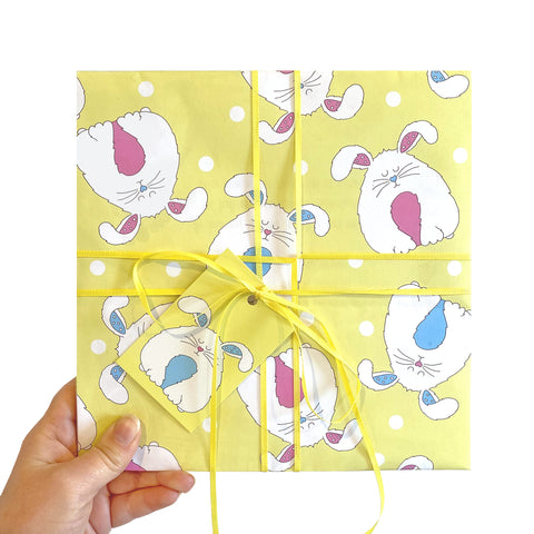 yellow new baby gift wrap with bunnies