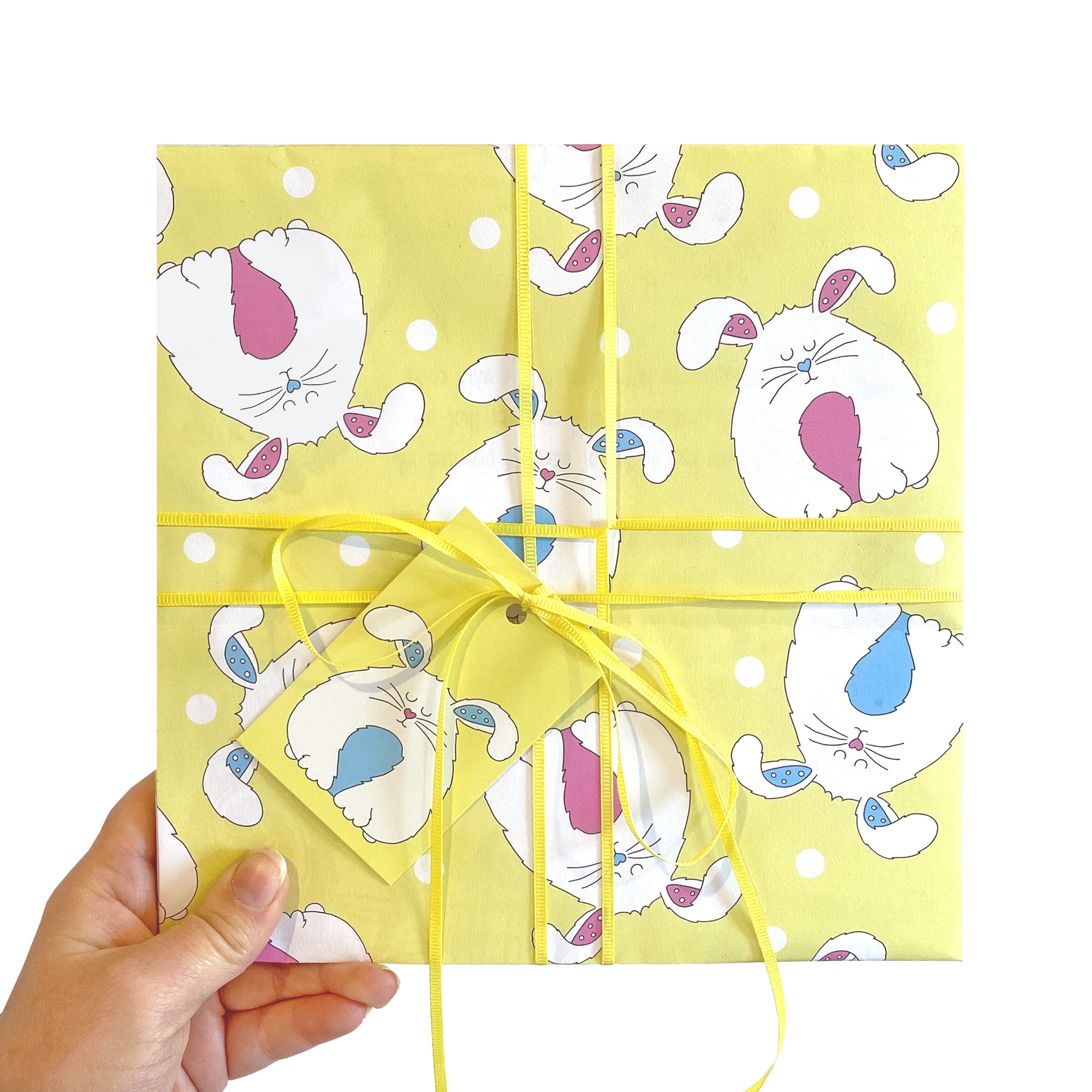 yellow new baby gift wrap with bunnies