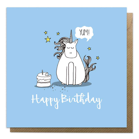 Blue birthday card with an illustration of unicorn and cake