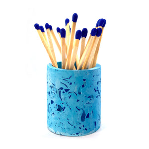 Blue match pot with blue matches