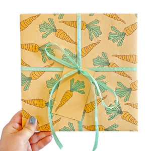 Orange wrapping paper covered in a carrot pattern