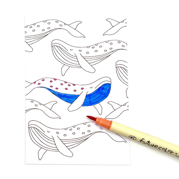 Colouring in postcard with a brush tip colouring pen