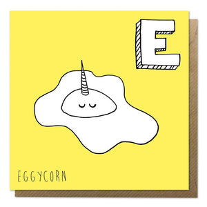 Yellow alphabet unicorn card featuring egg unicorn