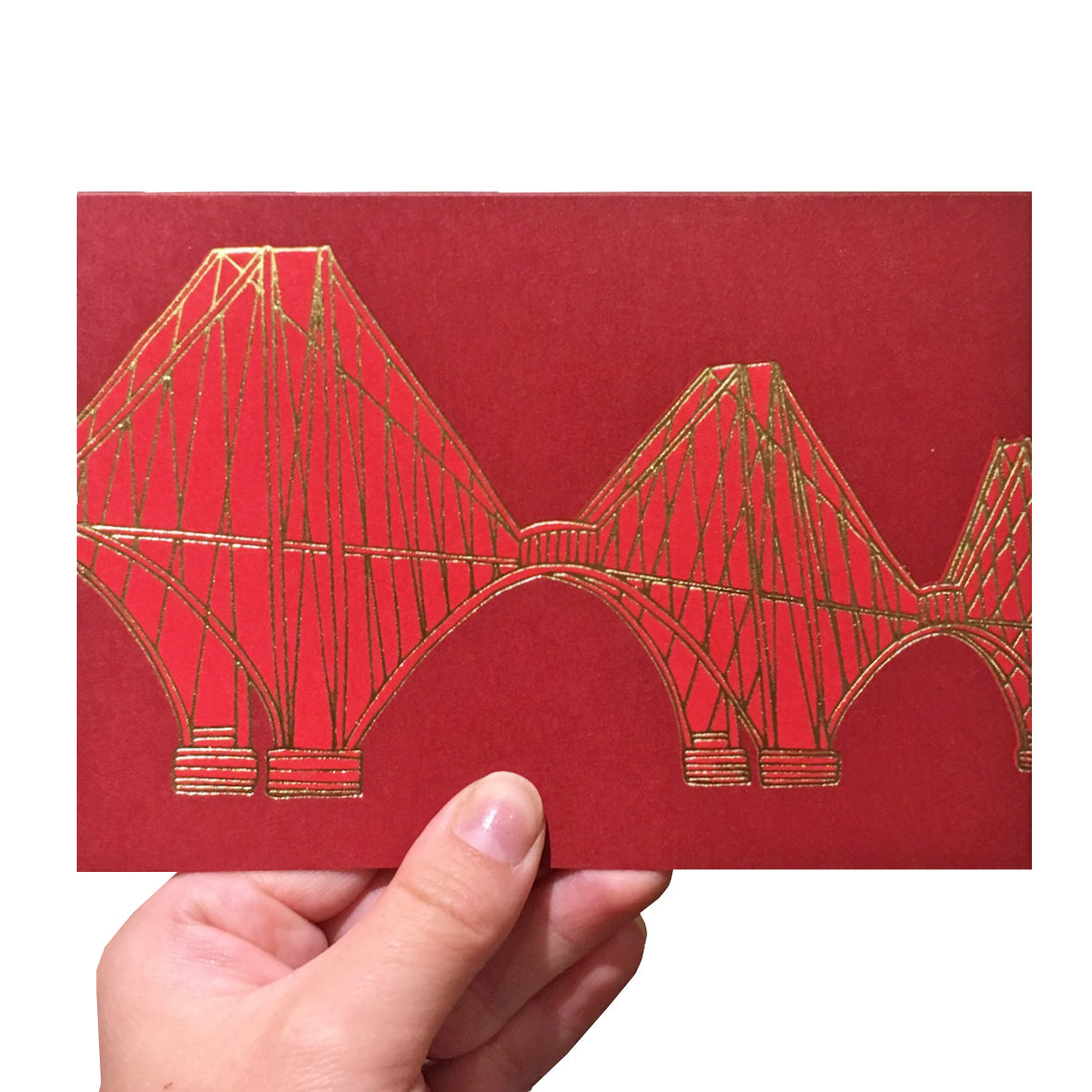 Red greeting card with a gold foiled illustration of the Forth Rail Bridge