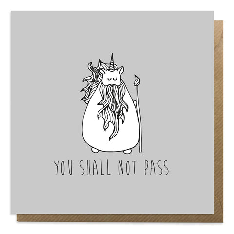 A grey greeting card with an illustration of Gandalf unicorn