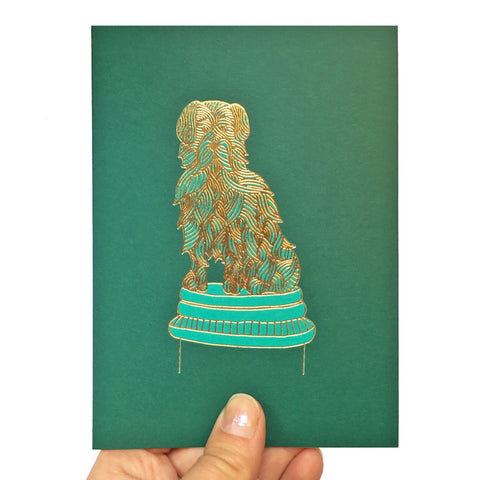 Card featuring a gold foiled Greyfriars Bobby illustration on a green background