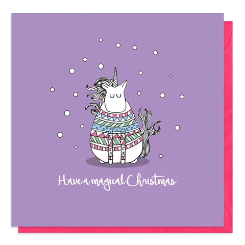Purple card with an illustration of a unicorn in a Christmas jumper