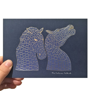 Navy blue card with a silver foil keplies sculpture illustration