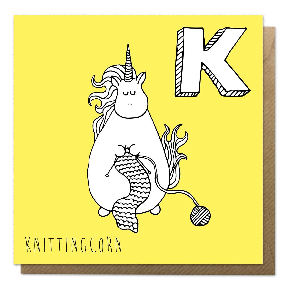Yellow unicorn alphabet card with an illustration of a knitting unicorn