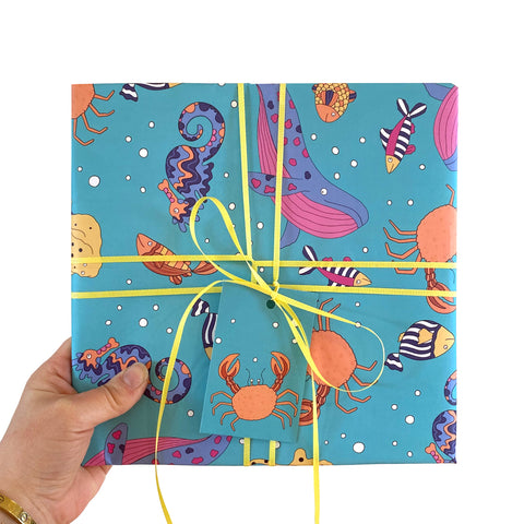 Blue wrapping paper with ocean animals