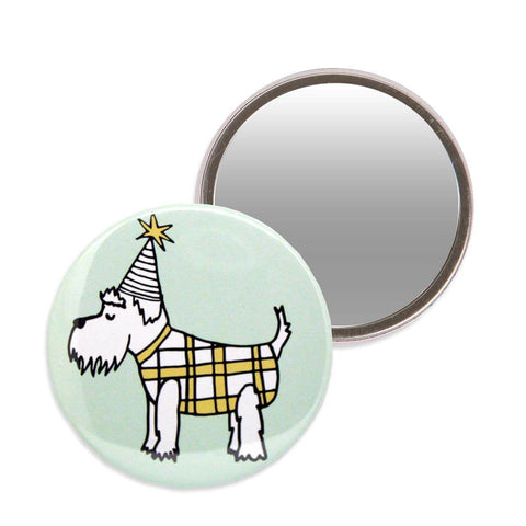 Green makeup mirror with an illustration of a schnauzer