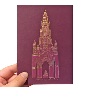 Purple greetings card with a gold foil illustration of the Scott Monument