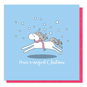 Blue Christmas card with an illustration of a unicorn in snow