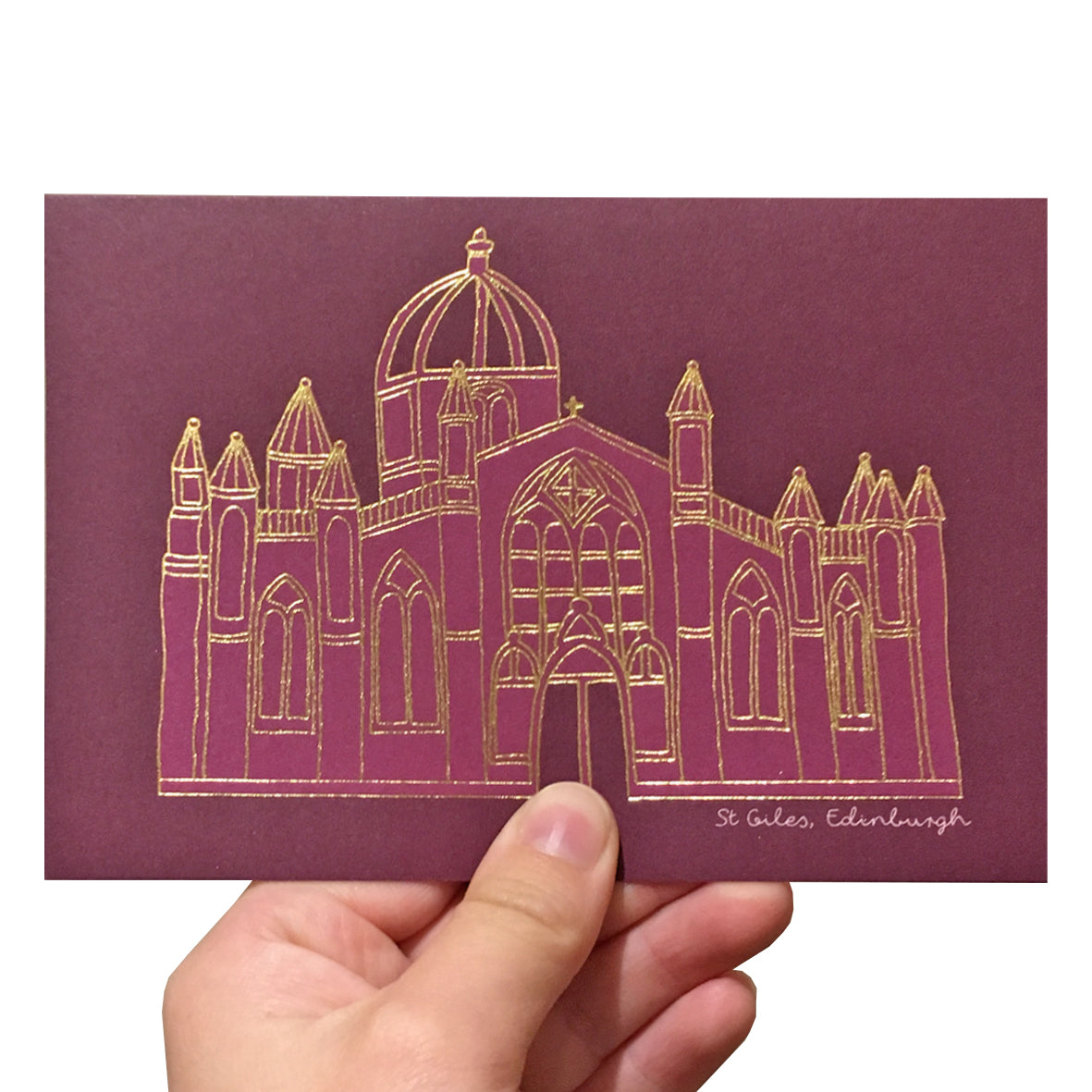 Purple greetings card with a gold foil illustration of St Giles church