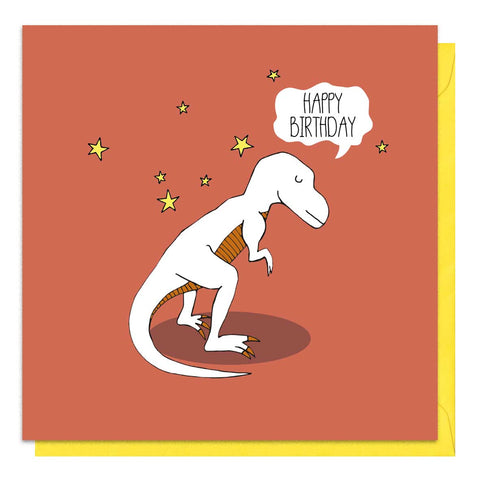 Red birthday card with an illustration of a t-rex 
