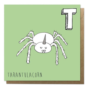 Green alphabet unicorn card with a tarantula unicorn