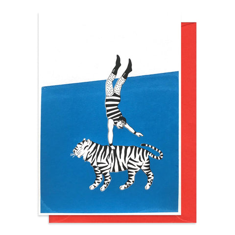 Greetings card featuring a print of an acrobat and a tiger