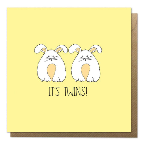 Yellow new twins card featuring two fluffy rabbits