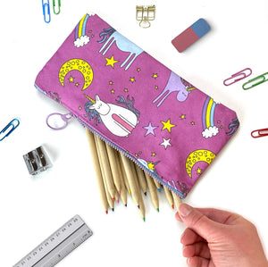 Pink pencil case with unicorn pattern