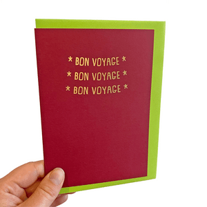 Red bon voyage card with gold foil lettering
