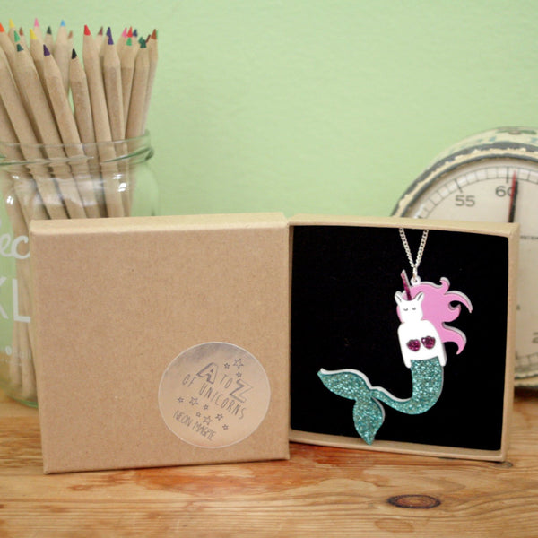 Unicorn mermaid acrylic necklace with a sparkly tail in a brown box