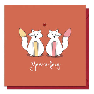 Red fox Valentine's Day card featuring an illustration of two foxes