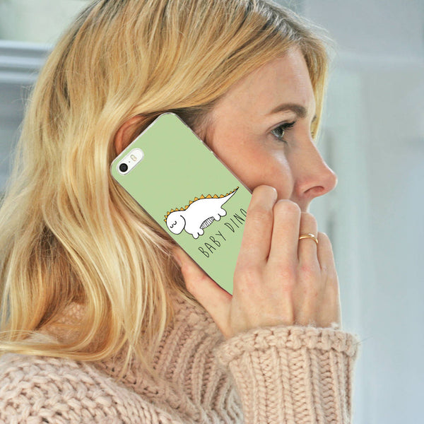 Lifestyle photo of baby dinosaur phone case